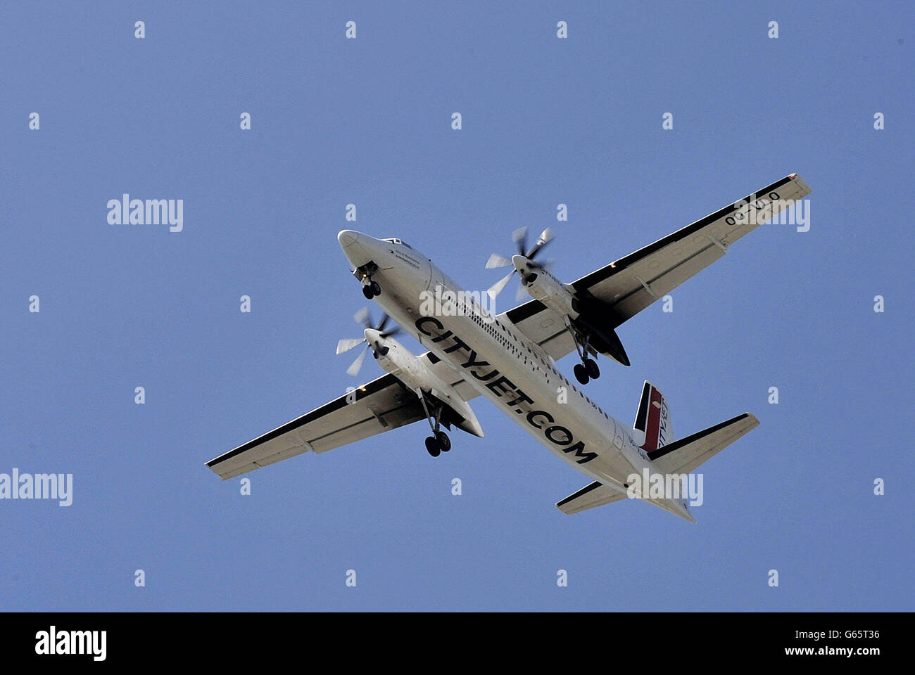 Cityjet.com - stock. A Cityjet turbo prop plane coming in to land at London City Airport. Stock Photo