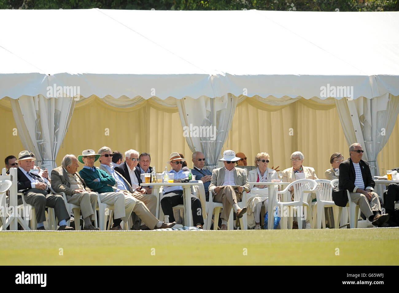 Fans watch the action from the beer tent at The Sports Ground