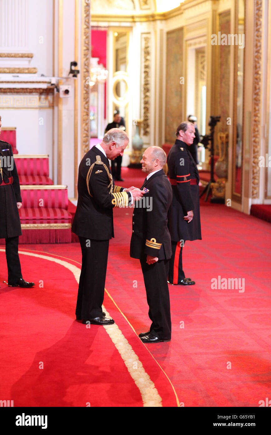 Lieutenant Commander Brian Meadows, Royal Naval Reserve, is made an MBE by the Prince of Wales at Buckingham Palace. PRESS ASSOCIATION Photo. Picture date: Friday June 7, 2013. Photo credit should read: Dominic Lipinski/PA Wire Stock Photo