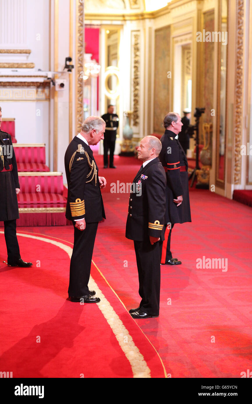Lieutenant Commander Brian Meadows, Royal Naval Reserve, is made an MBE by the Prince of Wales at Buckingham Palace. PRESS ASSOCIATION Photo. Picture date: Friday June 7, 2013. Photo credit should read: Dominic Lipinski/PA Wire Stock Photo