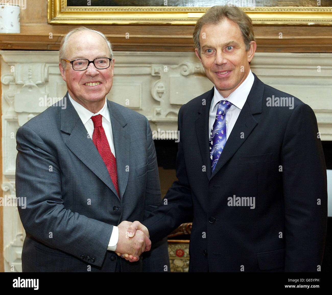 Britain's Prime Minister Tony Blair (R) greets chief U.N. weapons inspector Hans Blix ahead of talks on Iraq at Chequers in Buckinghamshire. Stock Photo