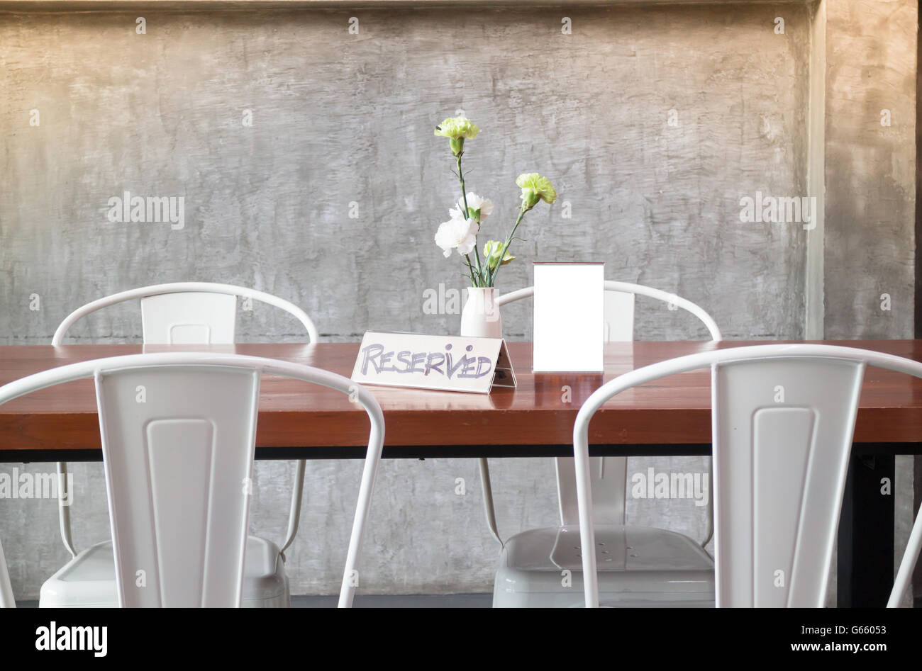 Mock up frame on table in bar restaurant cafe, stock photo Stock Photo