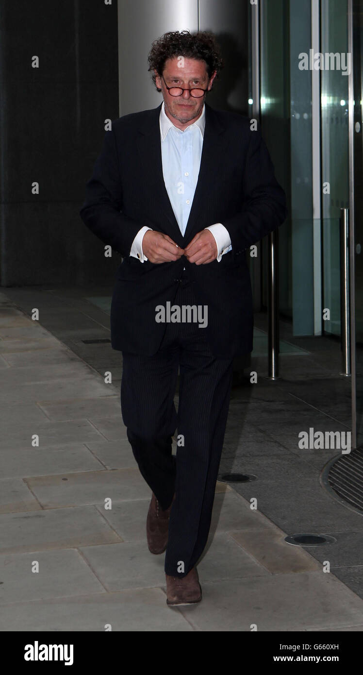 Marco Pierre White leaves the Royal Courts of Justice in central London. The chef is embroiled in a High Court row over the use of his name in association with a restaurant. Stock Photo