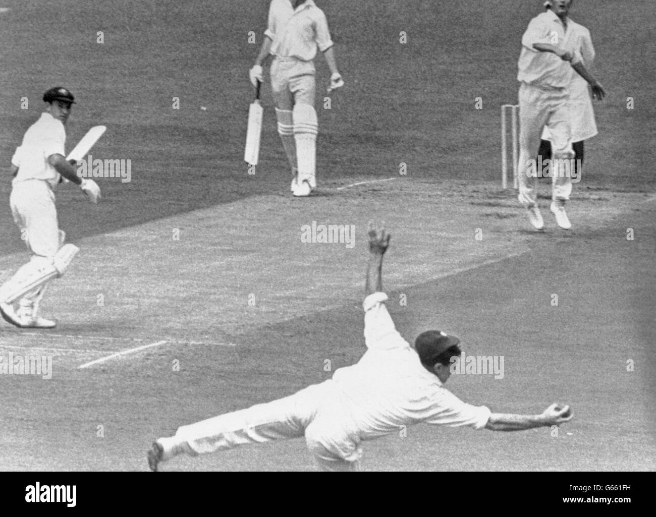 Cricket - Yorkshire v Australia - Day 2 - Bramall Lane, Sheffield. Fred Trueman makes a one-handed catch to end the run of Doug Walters at Bramall Lane in Sheffield. The bowler is Richard Hutton. Stock Photo