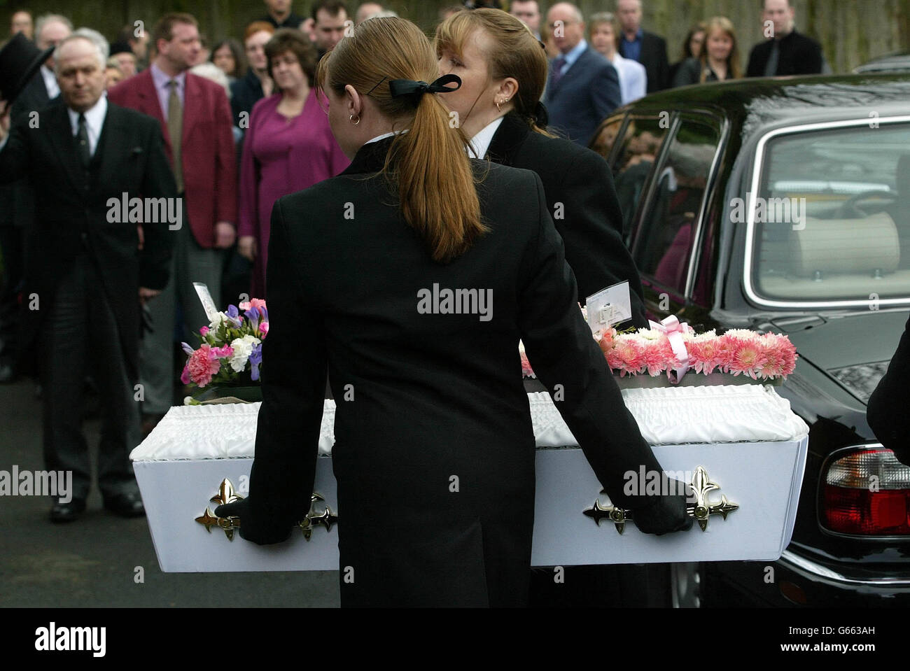 Three-year-old Isobel Appleton's coffin arrives at Warley Baptist Church, Birmingham. Isobel died on January 16 after she was struck by a hit and run driver while crossing Hagley Road West in Quinton. * A 40-year-old man from Quinton has since been charged with failing to stop after a road traffic collision, driving without insurance and driving otherwise than in accordance with his licence. Stock Photo