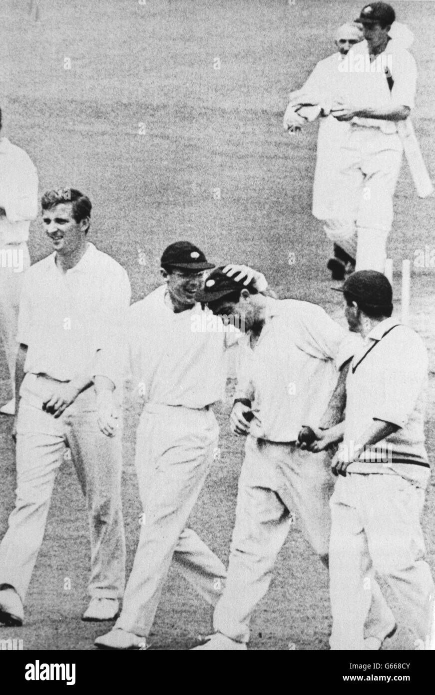 Geoff Boycott congratulates Fred Trueman as Yorkshire leave the field at Bramall Lane in Sheffield, following the captain's one-handed catch off Richard Hutton's bowling. Stock Photo