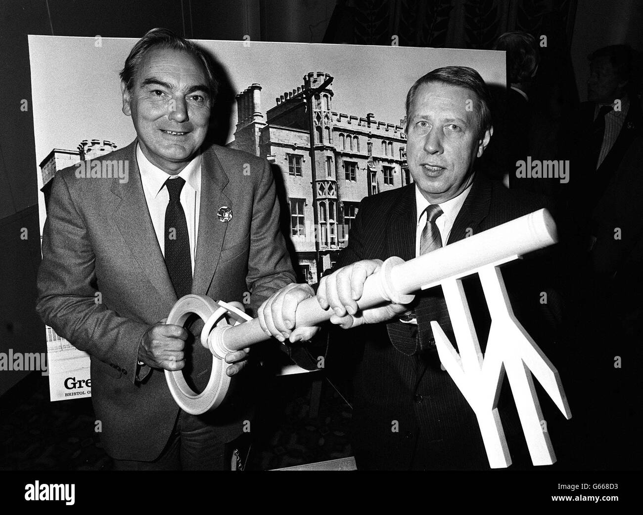 British Rail's Chairman, Sir Peter Parker (left) hands over a giant ornamental key to John Robers, a trustee of the Brunel Engineering Centre, at a ceremony at Paddington Station. Stock Photo