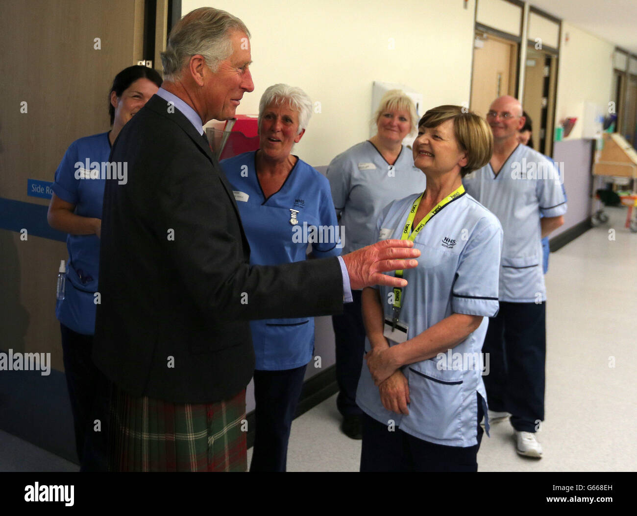 The Prince of Wales speaks with nurses during a visit to Ninewells Hospital in Dundee Stock