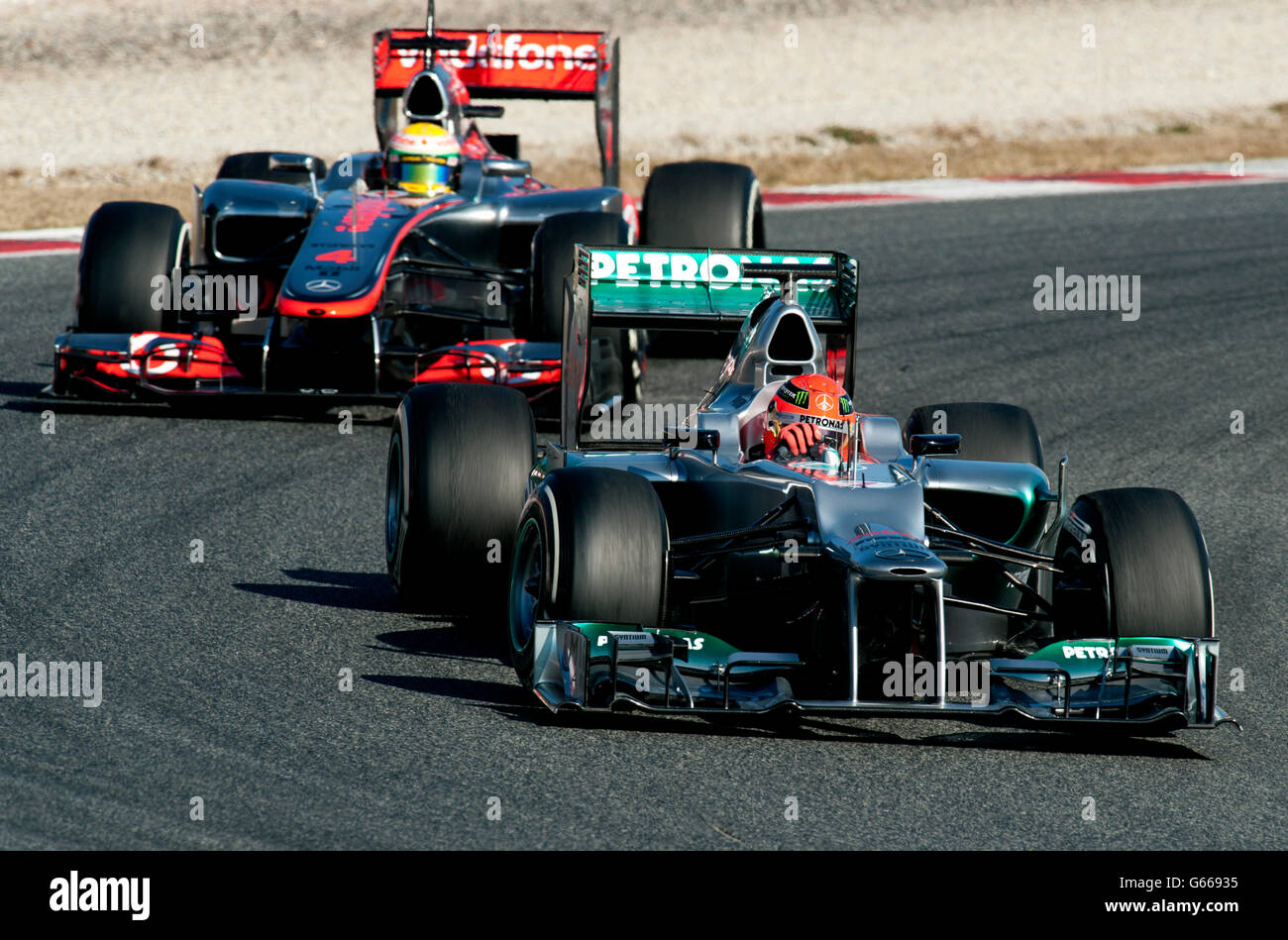 Michael Schumacher, GER, Mercedes AMG-Mercedes F1 W03, ahead of Lewis Hamilton, GB, McLaren-Mercedes MP4-27 Formula 1 testing Stock Photo