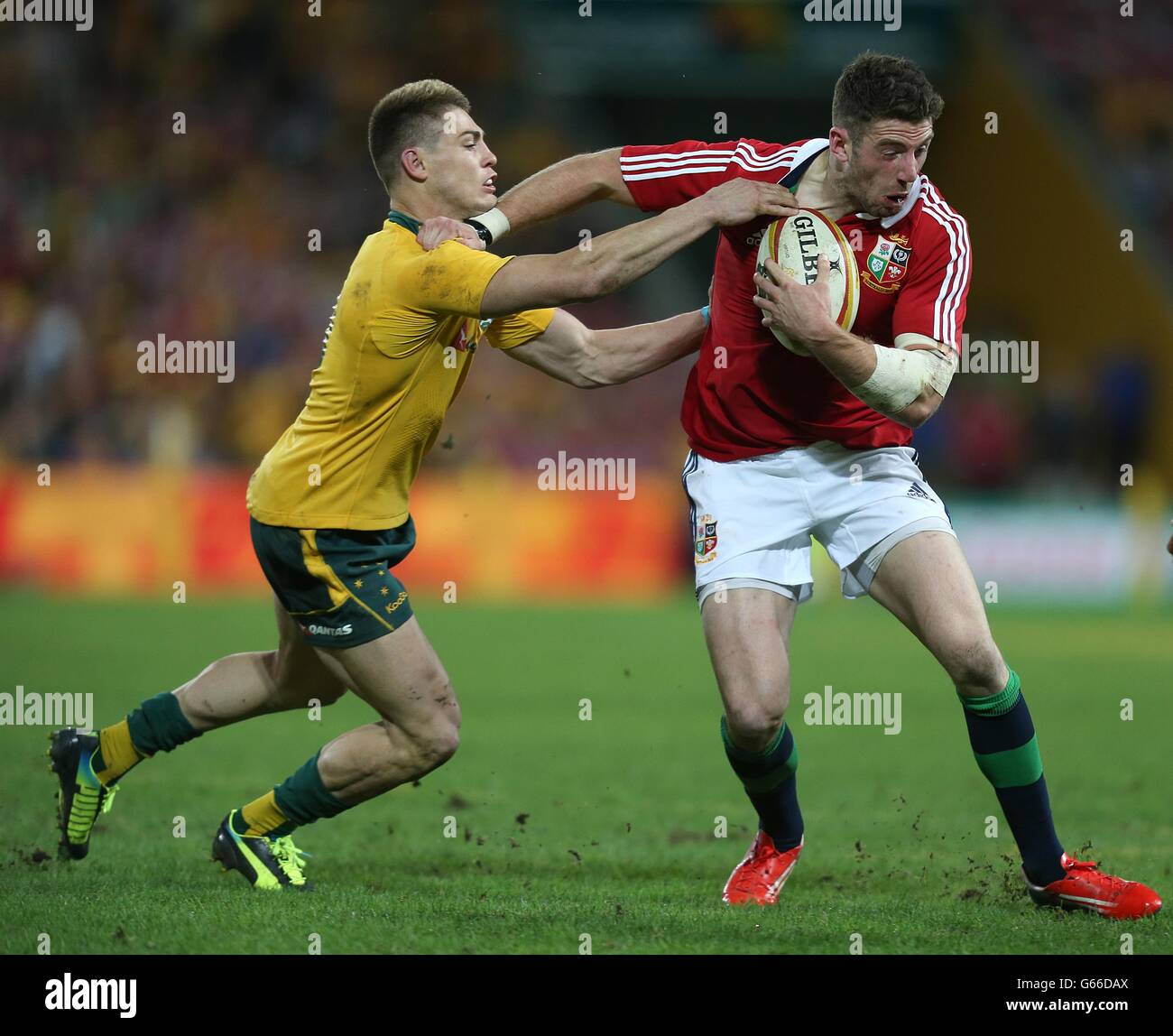 British and Irish Lions' Alex Cuthbert holds off Australia's James O ...