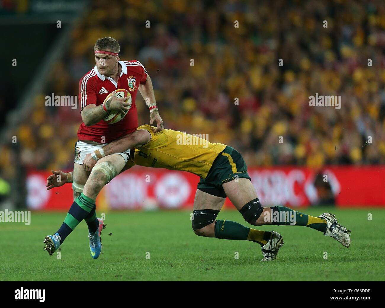 British and Irish Lions' Jamie Heaslip is tackled by Australia's Ben Mowen Stock Photo