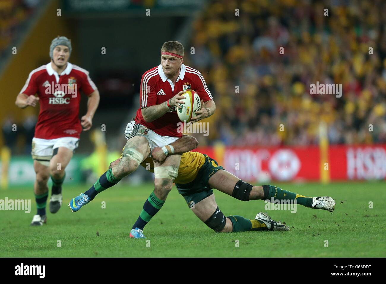 British and Irish Lions' Jamie Heaslip is tackled by Australia's Ben Mowen Stock Photo