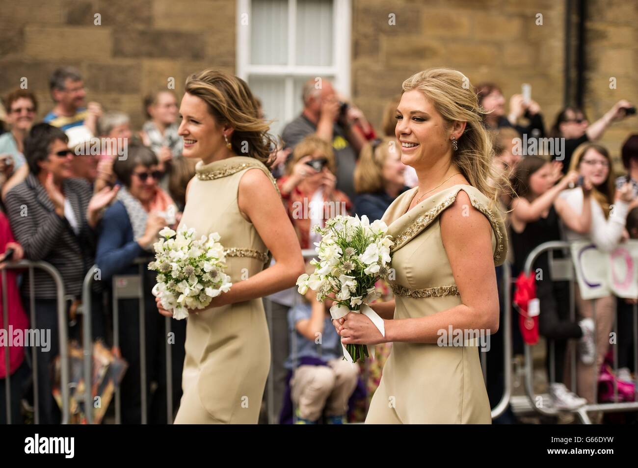 Chelsy Davy and Lady Katie Valentine, the sister of bride Lady Melissa Percy,26 , arrive at St Michael's Parish Church in Alnwick, for her marriage to Thomas van Straubenzee. Stock Photo