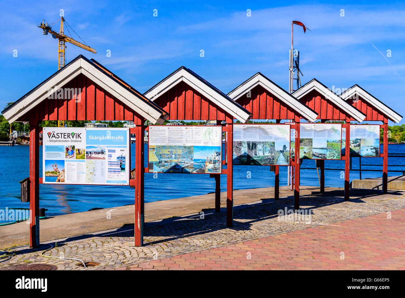 Vastervik, Sweden - June 19, 2016: Seaside information place with sections of notice boards on different structures. Tourist and Stock Photo