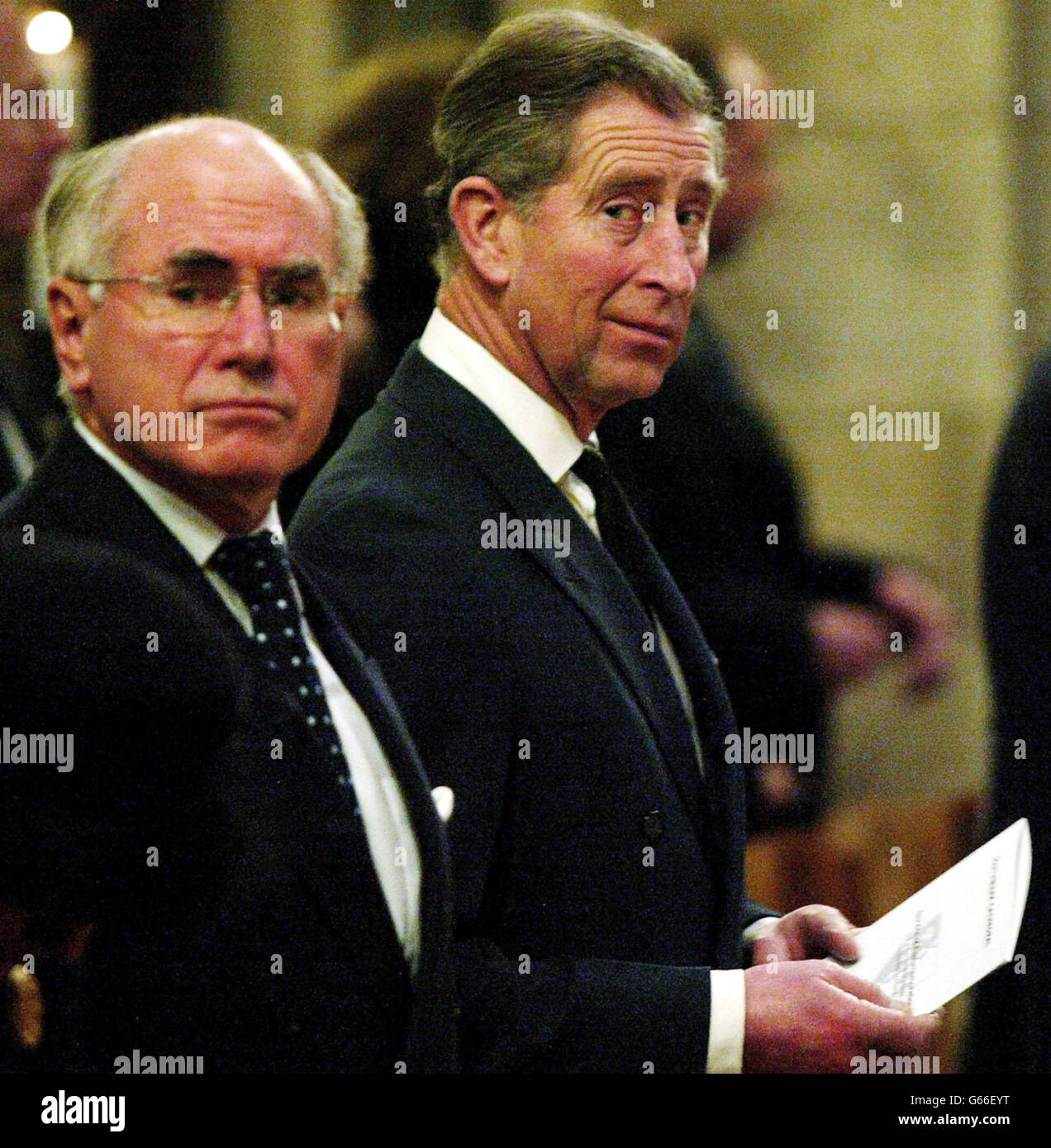 Australian Prime Minister John Howard and Britain's Prince Charles attend a Service of Commemoration for the victims of the Bali bombings on October 12, 2002 at Southwark Cathedral, London. * . At least 180 people died and scores were injured in the blasts which tore through the popular Sari club and Paddy's Bar in the Indonesian island resort Kuta exactly four months ago. Stock Photo