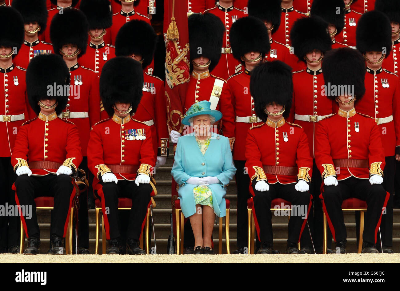 Queen Elizabeth II, ColonelinChief, Grenadier Guards, has her photo taken with Guards after