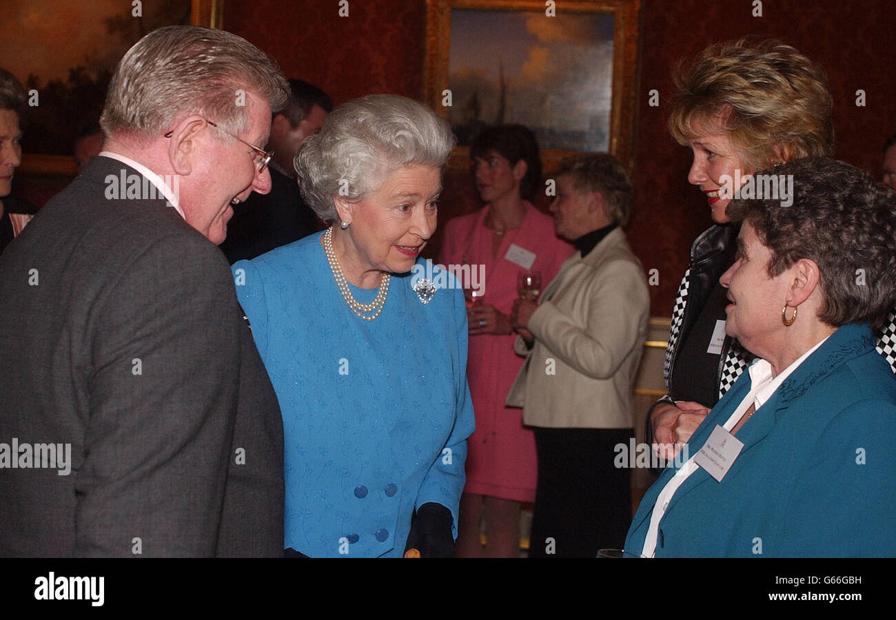 Queen Elizabeth Ii Talks To Scott Young Chairman And Owner And Nicola Rhodes Checked Jacket And Maureen Mantle From Syr Clean Com At The Queen S Awards For Industry Reception At Buckingham Palace London Queen Elizabeth Ii Talks To Scott Young Chairman And Owner And Nicola Rhodes Checked Jacket And Maureen Mantle From Syr Clean Com At The Queen S Awards For Industry Reception At Buckingham Palace London