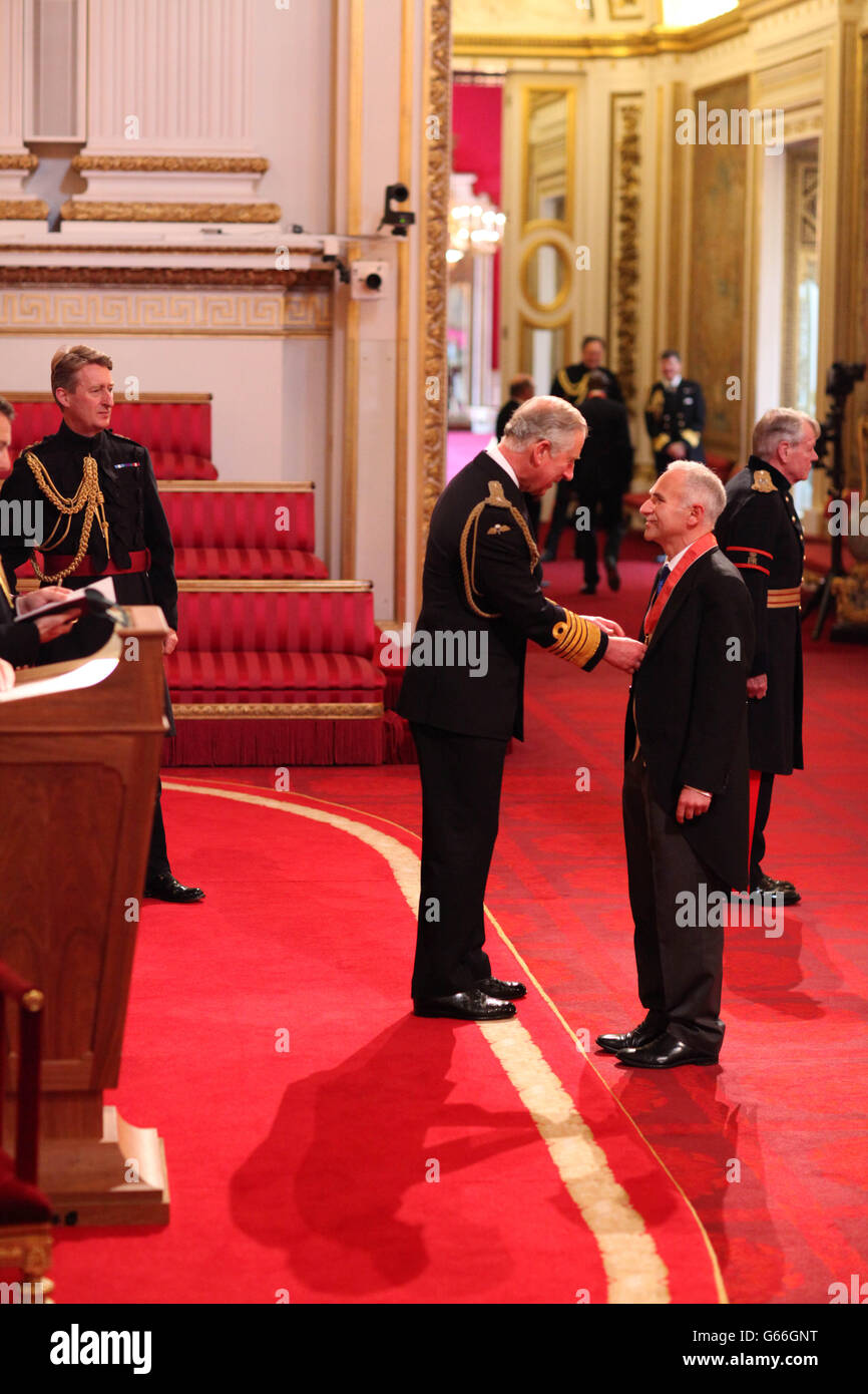 Finance and Programme Director for the Government Olympic Executive David Goldstone is awarded a CBE, for services to the Financial Administration of the London 2012 Olympic and Paralympic Games, by the Prince of Wales during an Investiture ceremony at Buckingham Palace in central London. Stock Photo