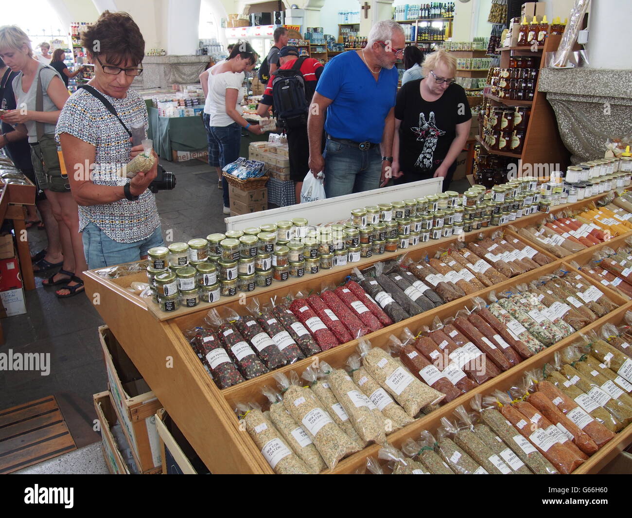 People shopping in indoor market in Kos Town, Greece Stock Photo