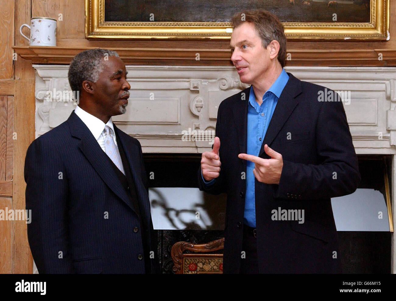 British Prime Minister Tony Blair (R) greets South African President Thabo Mbeki (L) at his country house in Chequers for talks. Stock Photo