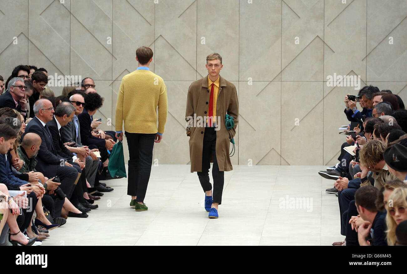 Models on the catwalk at The Burberry Prorsum show at the London  Collections: MEN SS14 at Kensington Gardens in London Stock Photo - Alamy