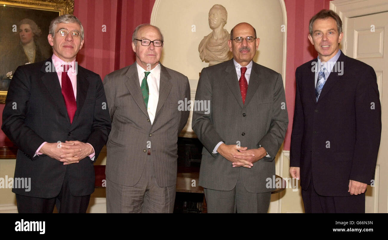 British Prime Minister, Tony Blair (right), poses with British Foreign Secretary Jack Straw (left), the United Nations Cheif Weapons Inspector, Hans Blix, (second left) and the Head of International Atomic Energy Agency Mohamed El Baradei, at 10 Downing Street. Mr El Baradei said Saddam Hussein's regime needed to show progress by the time the inspectors produced their next report to the UN on February 14. Stock Photo