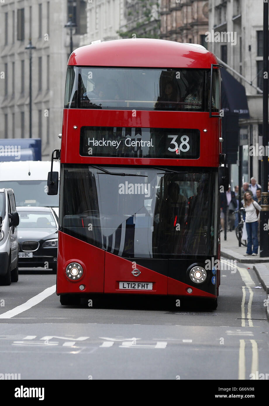 The new Routemaster bus used on the 38 route passes along Piccadilly, London. Services will start tomorrow on the first route to be served entirely by the new generation of hop-on, hop-off 'Boris buses'. Stock Photo