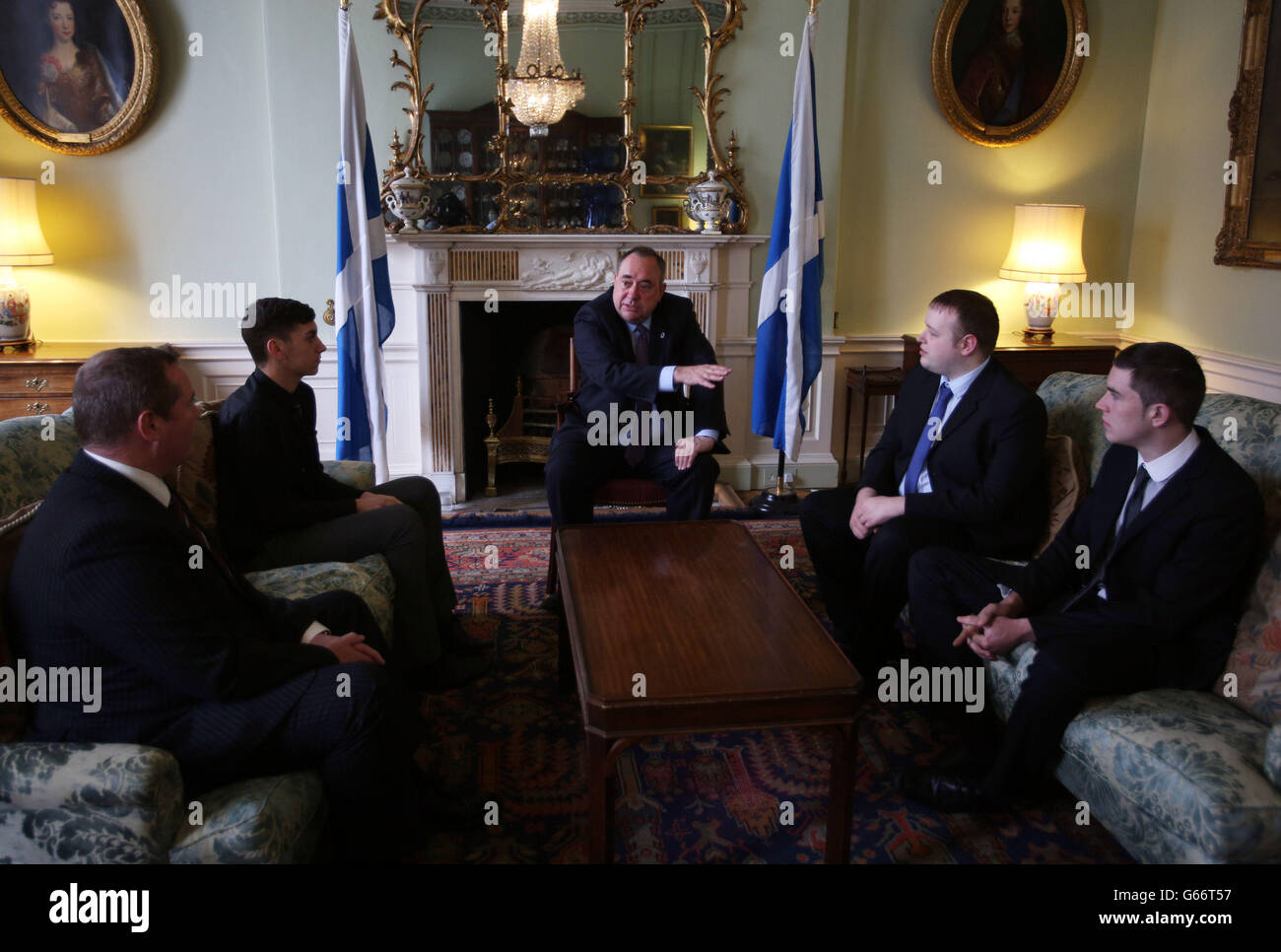 The Scottish First Minister Alex Salmond talks with apprentices from Steel Engineering at Bute House Edinburgh. Stock Photo