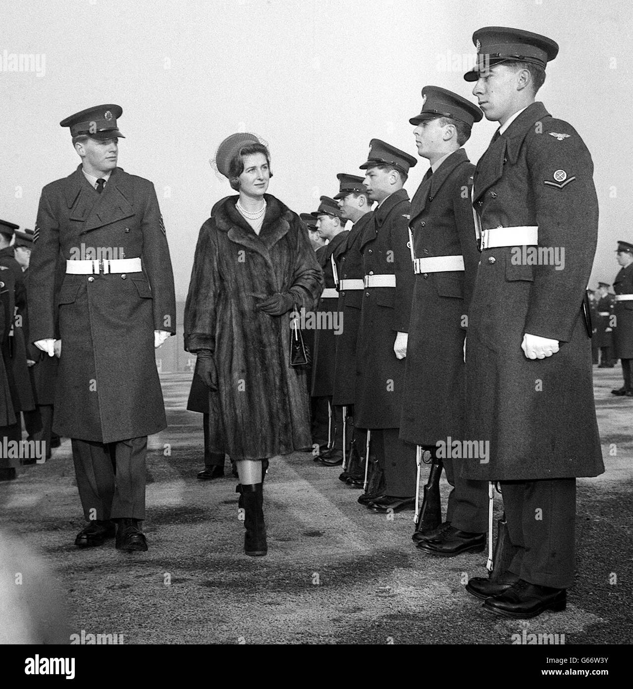 Princess Alexandra of Kent, wearing a warm fur coat and boots, is accompanied on a tour of inspection of Aircraft Apprentices at No.1 School of Technical Training, RAF, Halton, near Aylesbury. Stock Photo