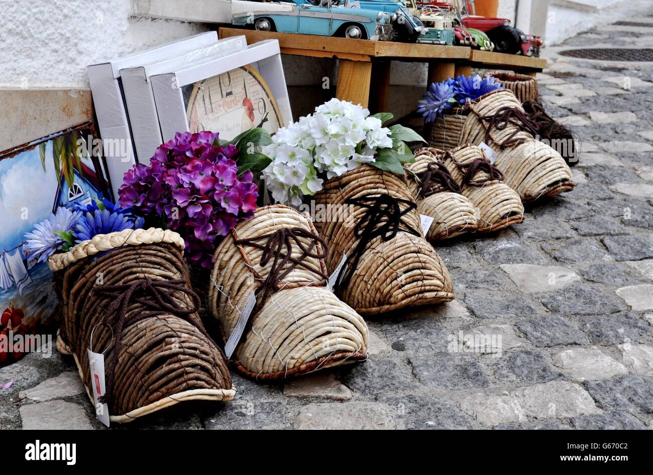 Row of rubber boots with flowers in hi-res stock photography and images ...