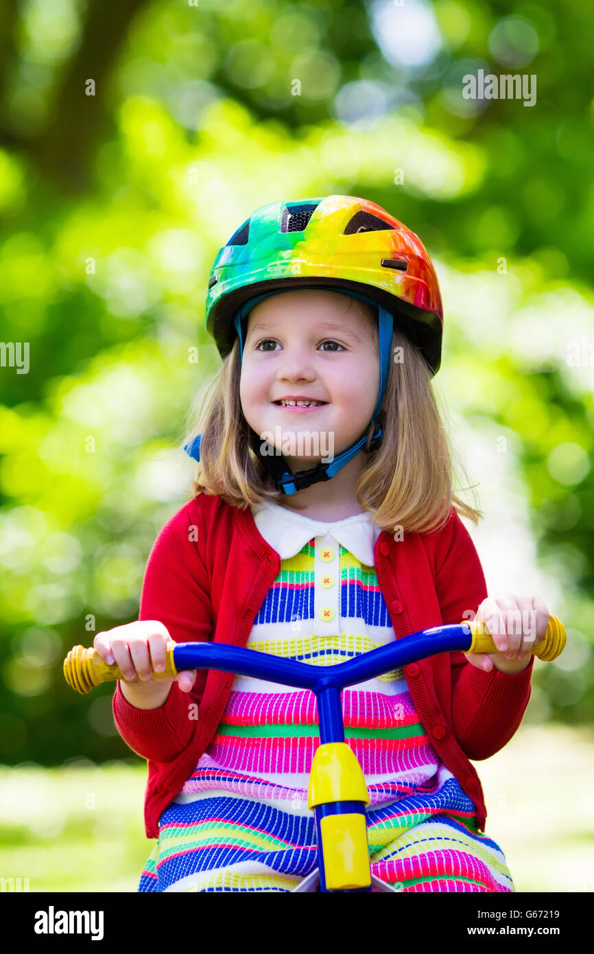 Baby riding tricycle hires stock photography and images Alamy