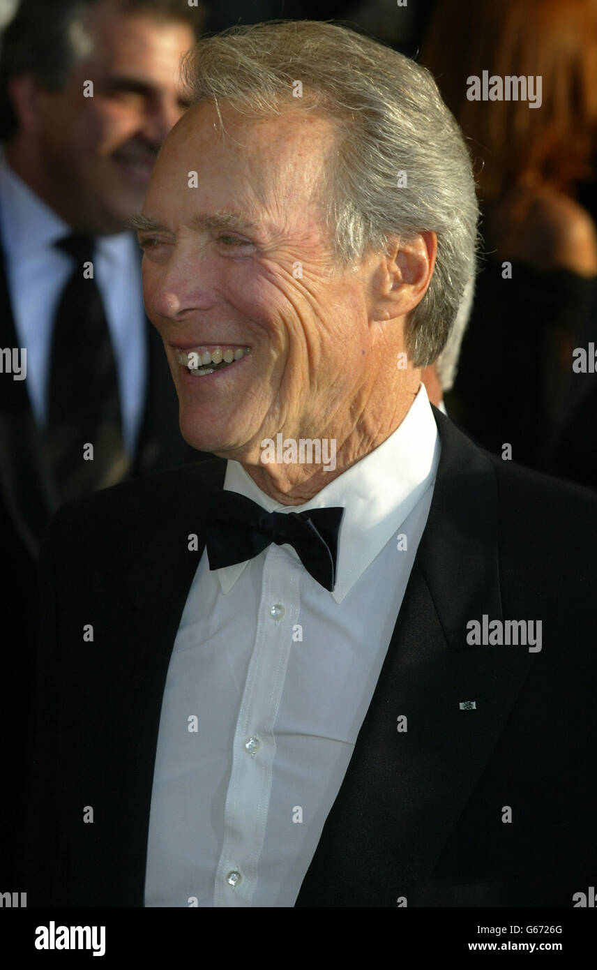 Actor Clint Eastwood smiles as he arrives on the red carpet for the 9th annual Screen Actors Guild Awards at the Shrine Auditorium in Los Angeles. Stock Photo