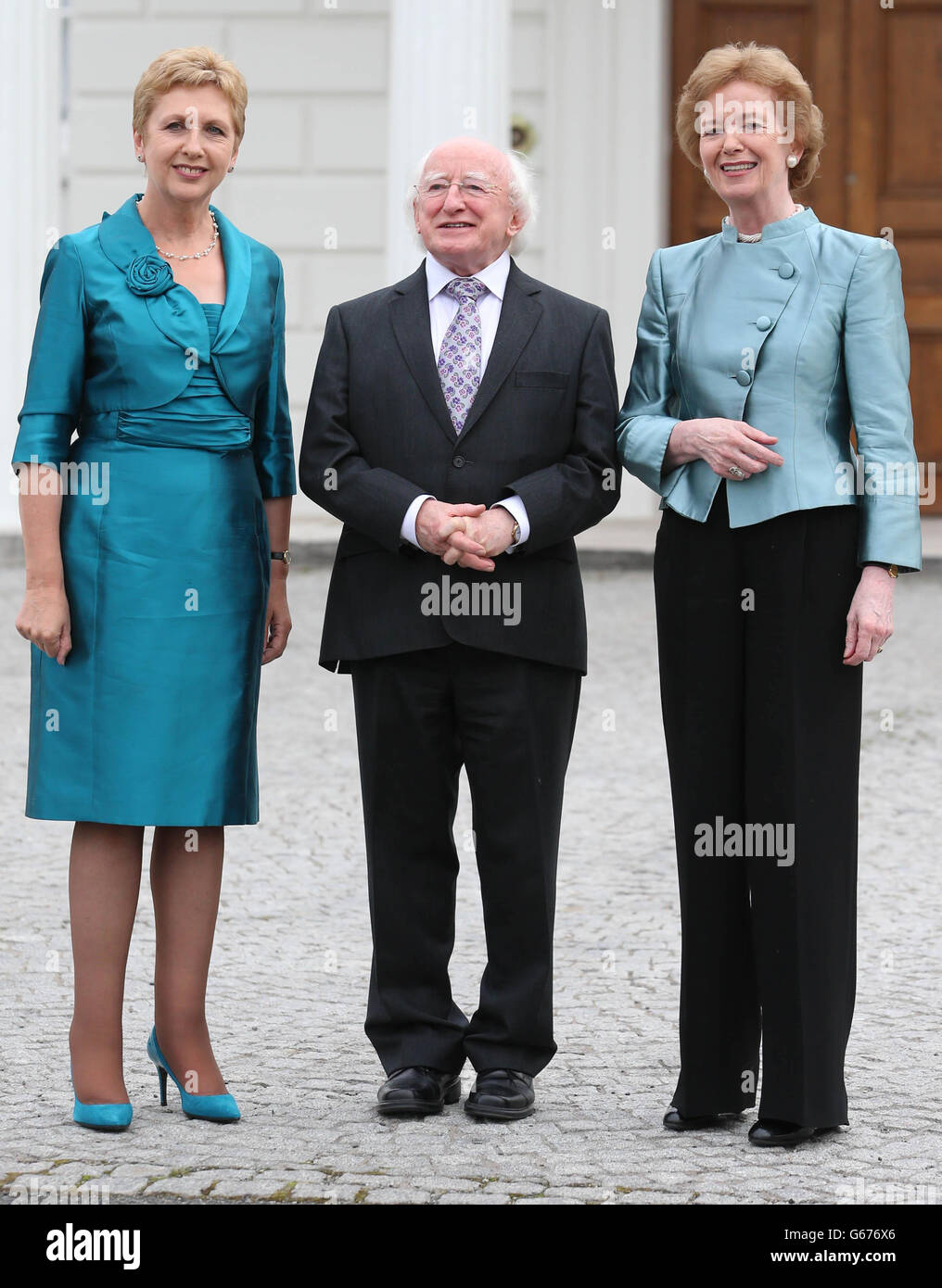 Former presidents Mary McAleese (left) and Mary Robinson (right) join President Michael D Higgins at Iras An Uachtarain for a dinner to commemorate the 75th anniversary of role of the President of Ireland. Stock Photo