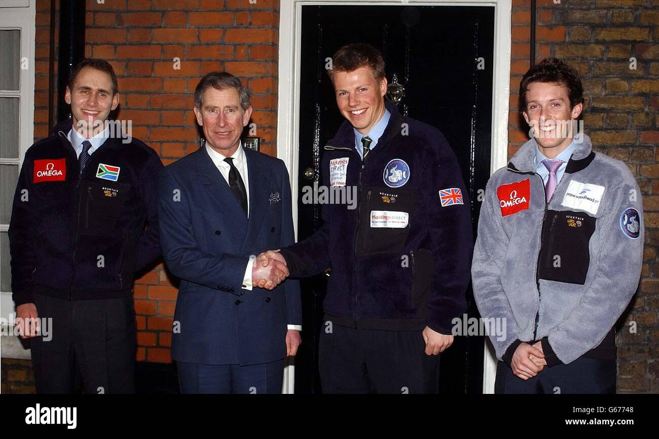 The Prince of Wales shakes hands with Tom Avery aged 27, the youngest Briton to have walked to the South Pole. * Avery completed the walk in a record time of 45 days and 6 hours and broke the record with 2 fellow walkers Andrew Gerber (left) aged 27 from South Africa, and Patrick Woodhead (right) also aged 27 from Bury St Edmonds in Suffolk. The three walkers compleated their epic journey on the 28th December last year, the three walking record breakers met Prince Charles at St James's Palace in Central London. Stock Photo