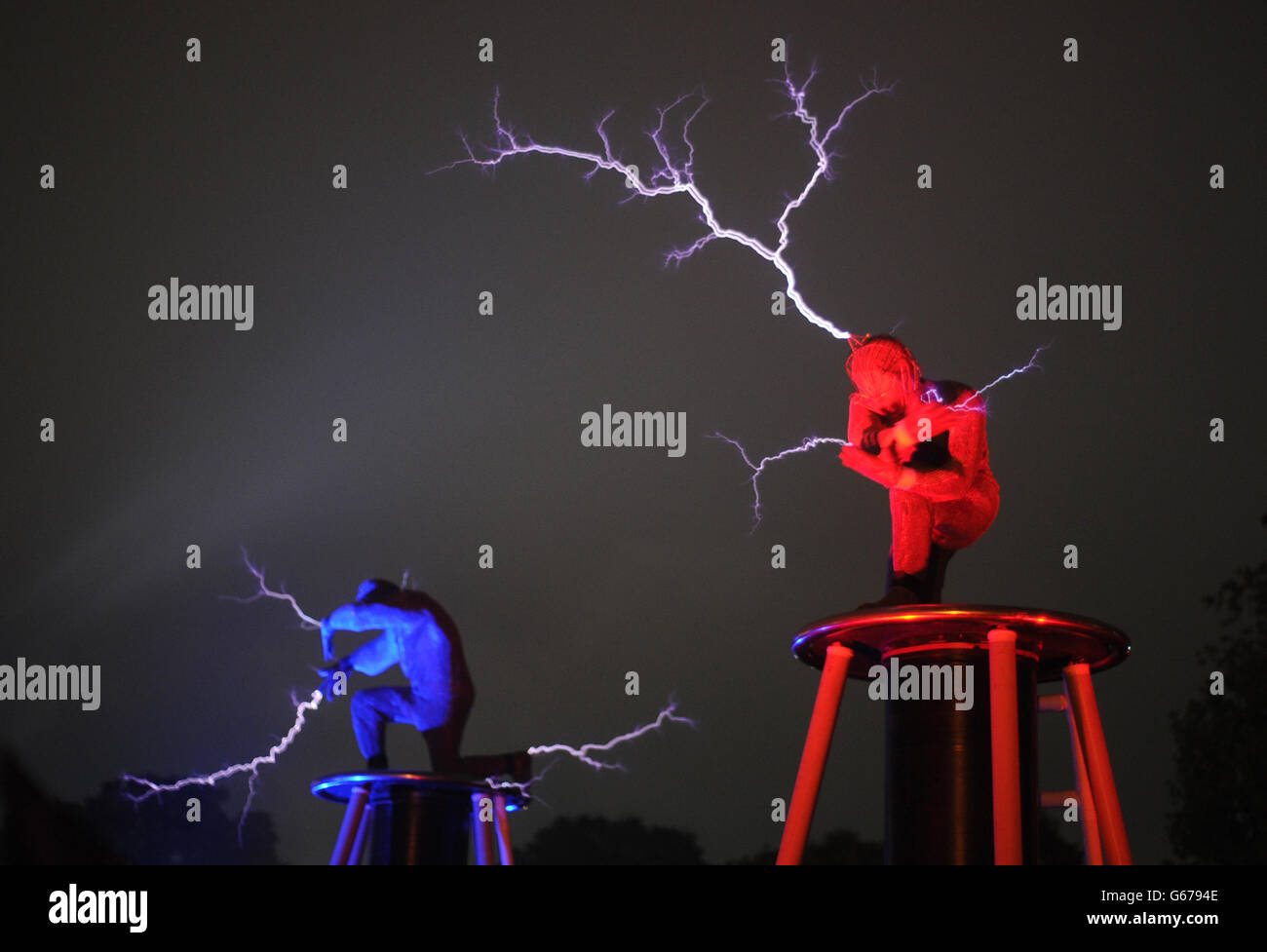 Performers conduct electricity during the Glastonbury 2013 Festival of Contemporary Performing Arts at Pilton Farm, Somerset. Stock Photo