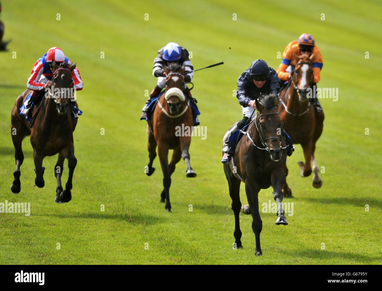 Ernest Hemingway ridden by Seamie Heffernan (second right) wins The At The Races Curragh Cup during Oxigen Environmental Pretty Polly Stakes Day at Curragh Racecourse in Co. Kildare, Ireland. Stock Photo