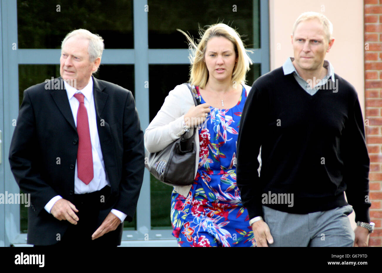 Former SAS sniper, Sgt Danny Nightingale, arrives with his wife Sally and father Humphrey, at the at the Military Court Centre, Bulford, Wiltshire, as he returns to court today to face a retrial, the two-week trial is expected to begin with two days of legal arguments at the Military Court Centre, before any evidence is heard. Stock Photo