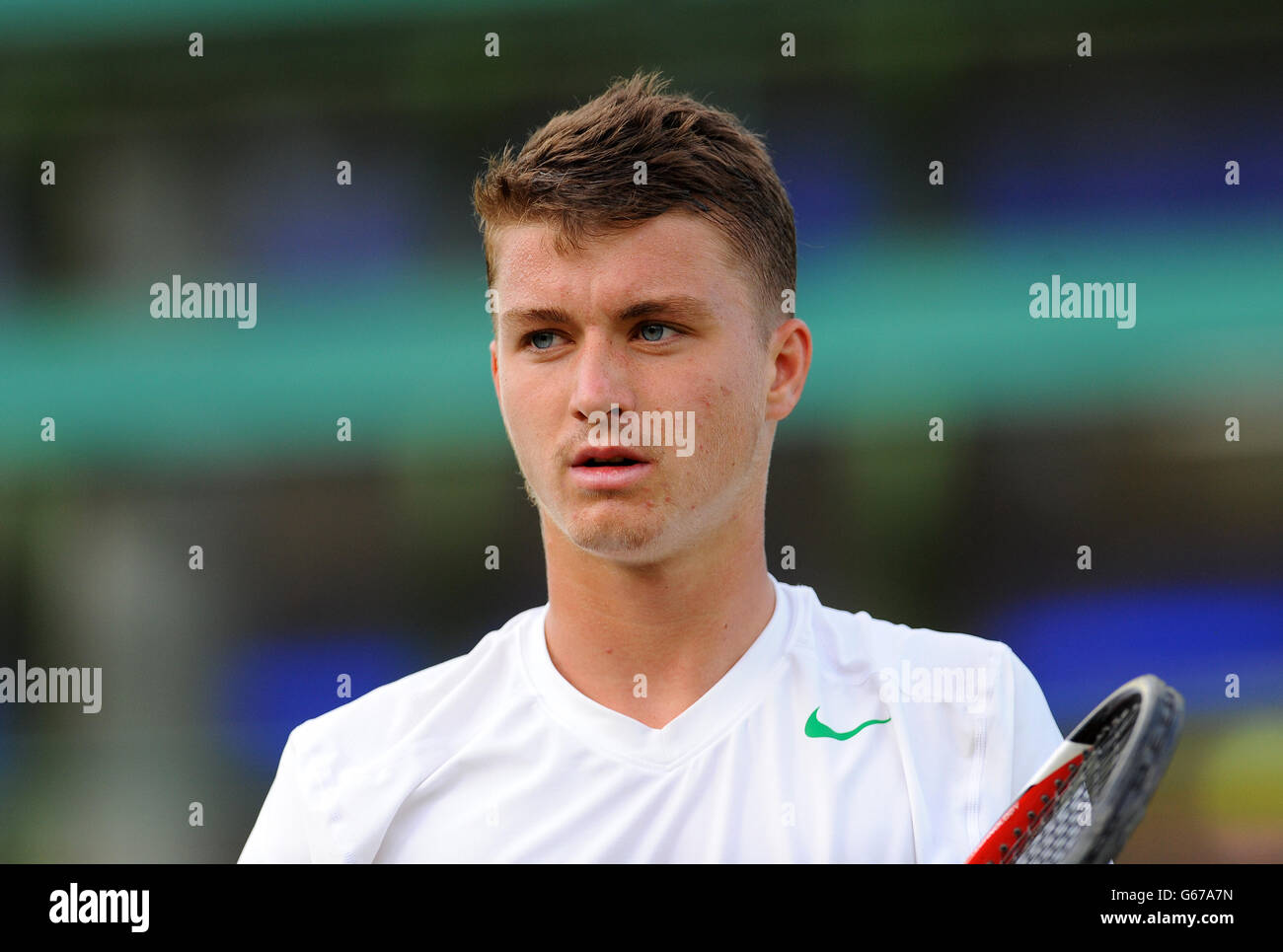 Great Britain's Jonny O'Mara plays against France's Maxime Janvier in his Boy's Singles match during day seven of the Wimbledon Championships at The All England Lawn Tennis and Croquet Club, Wimbledon. PRESS ASSOCIATION Photo. Picture date: Monday July 1, 2013. See PA story TENNIS Wimbledon. Photo credit should read: Dominic Lipinski/PA Wire. RESTRICTIONS: . No commercial use. No video emulation. No use with any unofficial third party logos. Stock Photo