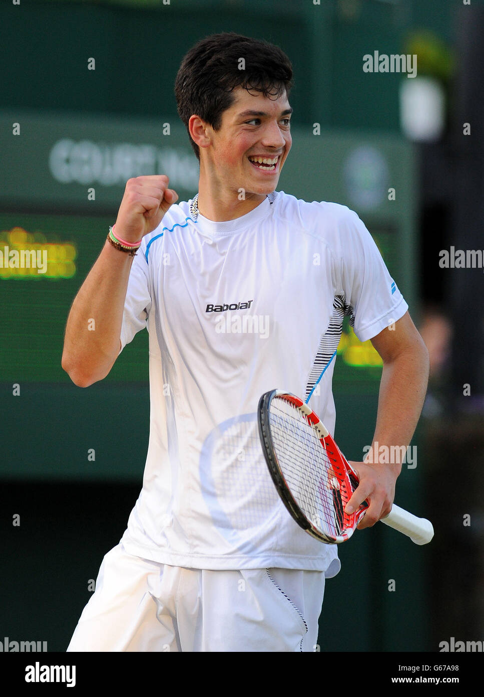 Great Britains Julian Cash celebrates defeating Australias Harry Bourchier during day seven of the Wimbledon Championships at The All England Lawn Tennis and Croquet Club, Wimbledon Stock Photo