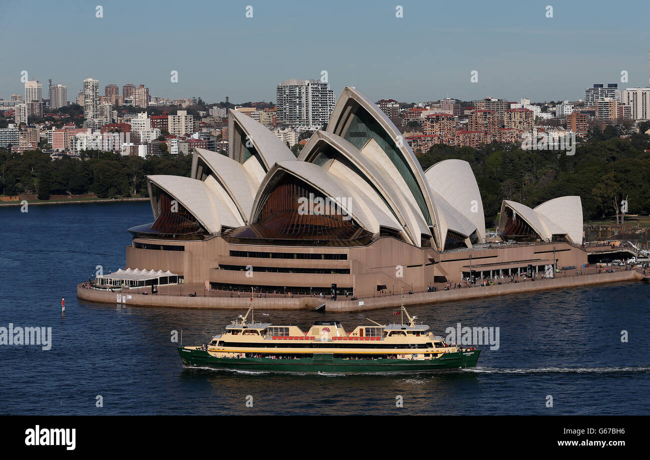 City Views - Sydney. The Manly Ferry passes in front of the Sydney Opera House in Sydney, Australia. Stock Photo