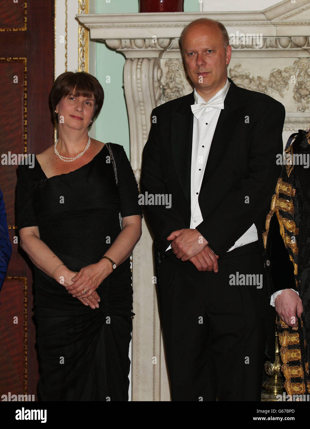 Justice Secretary Chris Grayling and his wife Susan attend the Lord Mayor of the City of London dinner to Her Majesty's judges, at The Mansion House in London. Stock Photo