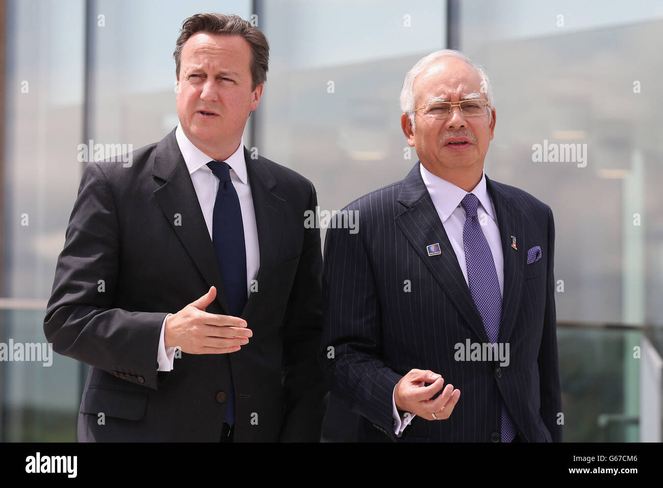 Prime Minister David Cameron holds a bilateral meeting with Najib Razak (right), the Prime Minister of Malaysia, at Battersea Power Station in London. Cameron said it was 'about time' as he hailed the start of an &Acirc;&pound;8 billion redevelopment of Battersea Power Station. Stock Photo