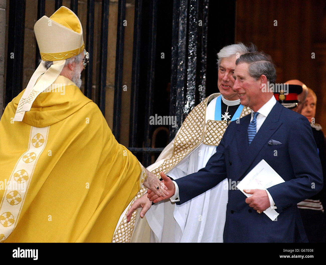 The Archbishop of Canterbury Dr Rowan Williams with The Prince of Wales, and the Dean of Canterbury Robert Willis, at the West door of Canterbury Cathedral after the Enthronement ceremony. Stock Photo