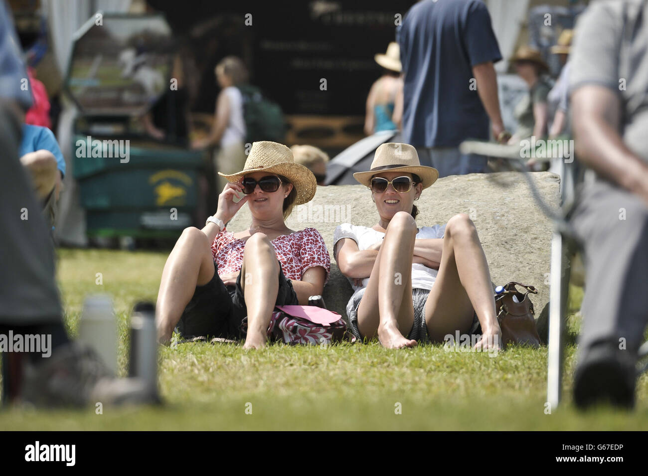 Equestrian fans enjoy the hot sunshine during day four of the Barbury International Horse Trials at Barbury Castle, Wiltshire. Stock Photo
