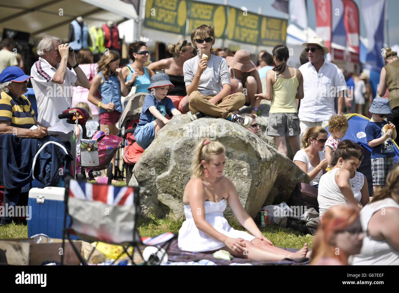 Equestrian fans enjoy the hot sunshine during day four of the Barbury International Horse Trials at Barbury Castle, Wiltshire. Stock Photo