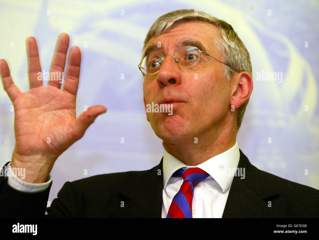 Labour MP Jack Straw talks during a community meeting at the Ivy Street