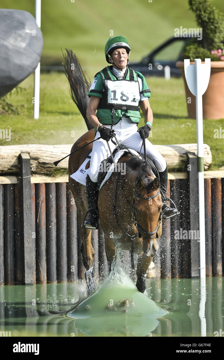 Great Britain's Mary King lands awkwardly in the Hippo Water on Imperial Cavalier in the Cross Country during day four of the Barbury International Horse Trials at Barbury Castle, Wiltshire. Stock Photo