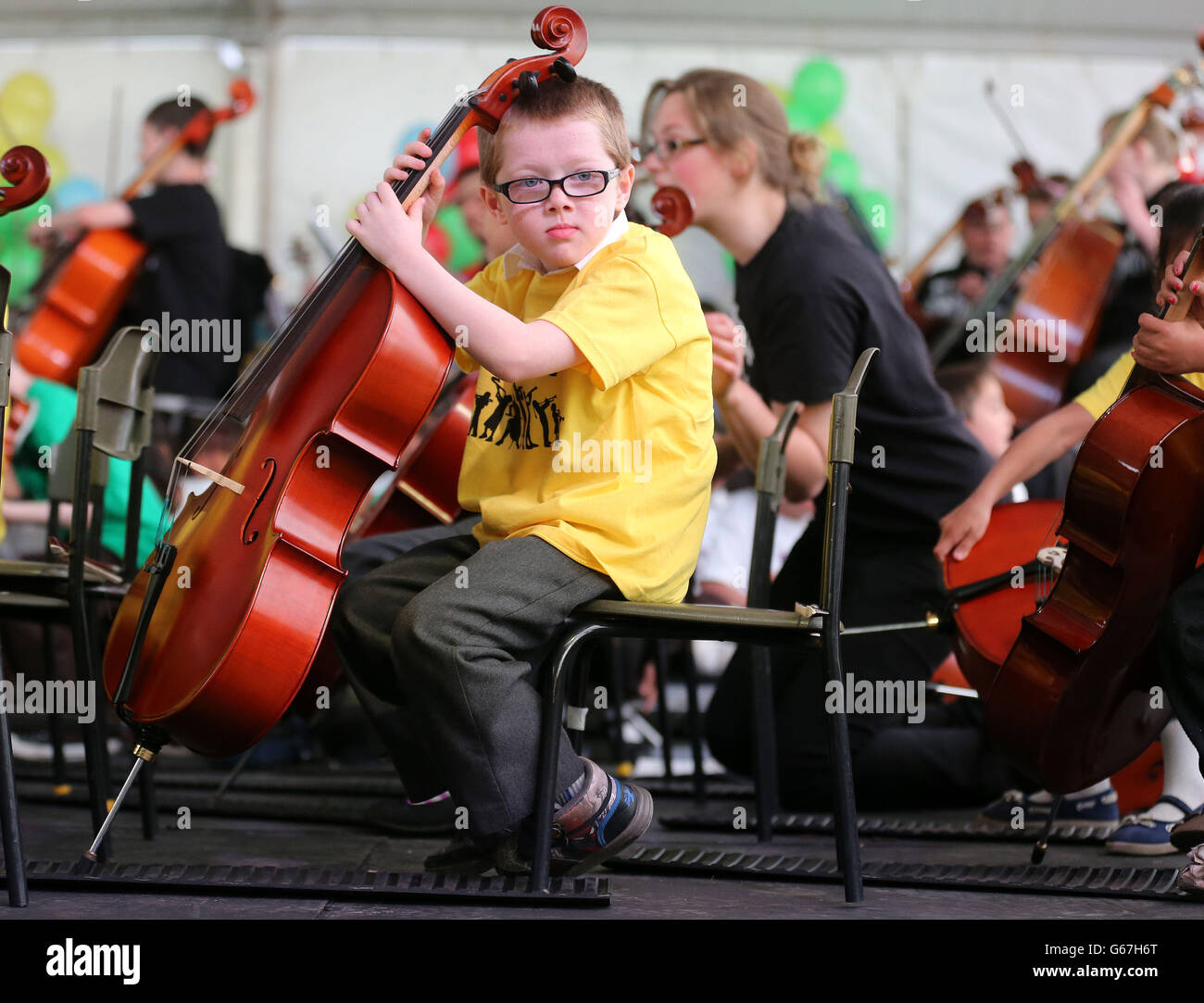 Children from local Govan Primary Schools perform at The Big Noise Orchestra community concert in Govan, Glasgow. Stock Photo