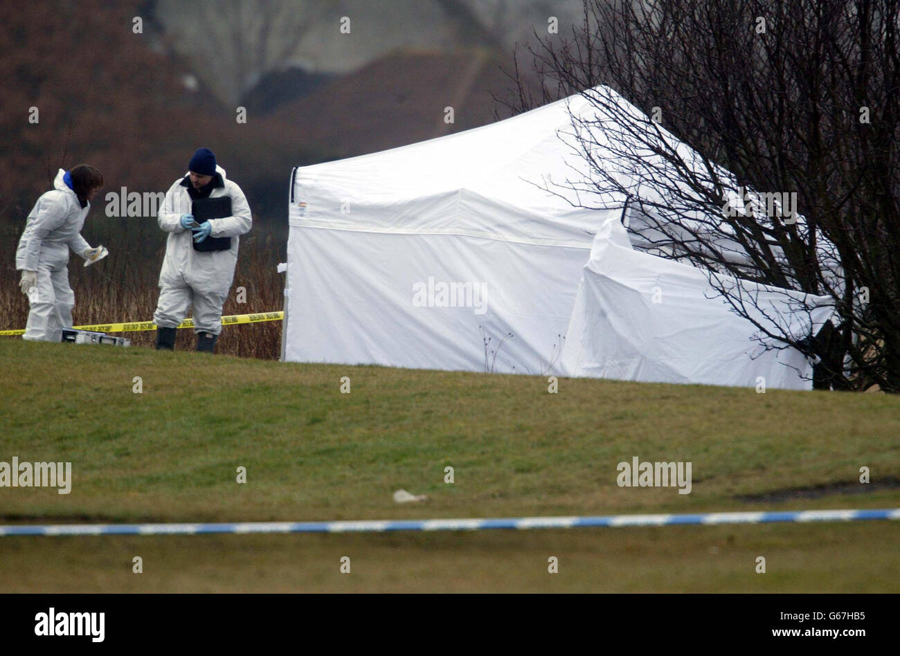 Forensic officers in Cramlington, Northumberland where a 14-year-old girl was found murdered. An 18-year-old youth was arrested last night close to the scene. * The victim has not yet been formally identified but trained family liaison officers were today with her family. Stock Photo