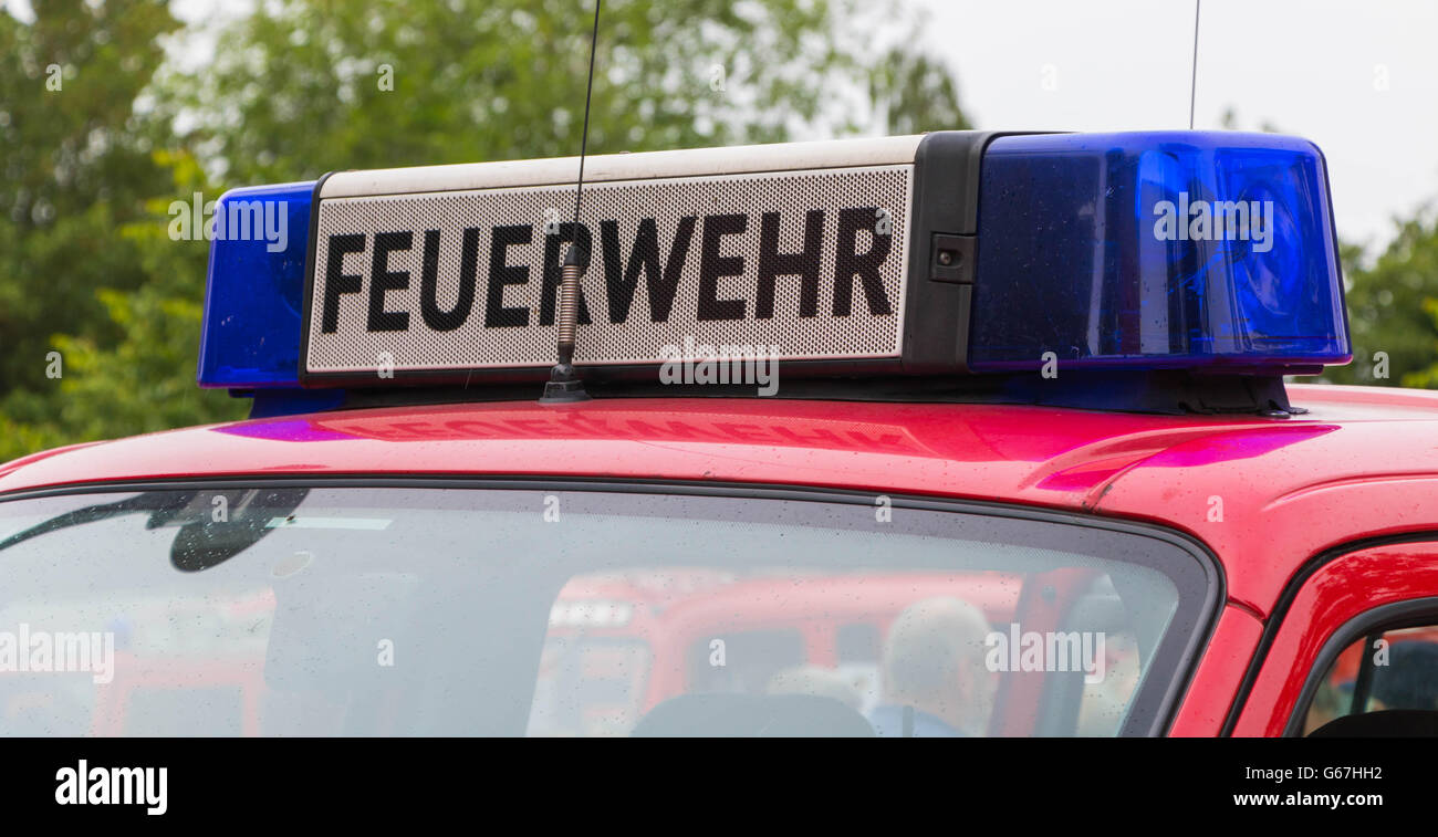 blue light bar and horn on a German firetruck Stock Photo